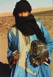 Berber nomad holding the main mass of Bensour - 9.2 kilograms